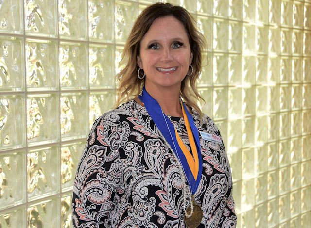 Wendy Elmore with PTK Medals Wendy Elmore with PTK Medals